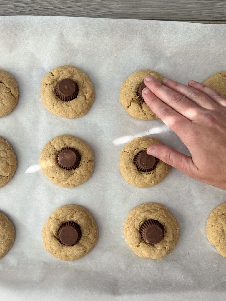 assembling the spider cookies