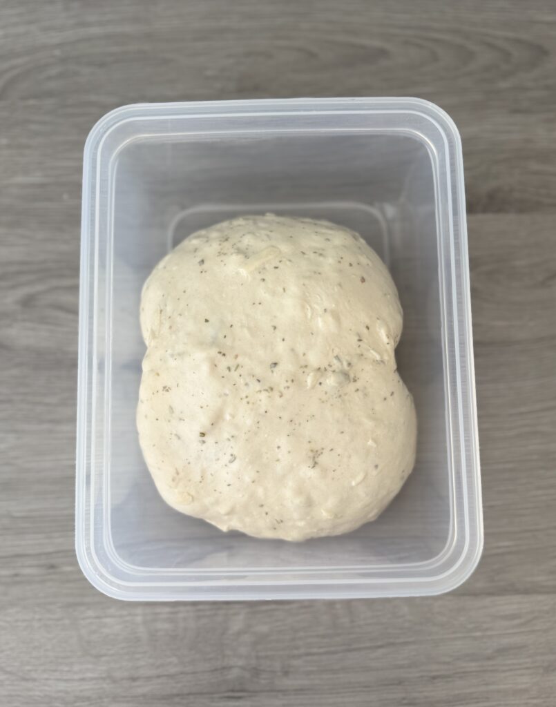 ciabatta dough in proofing container