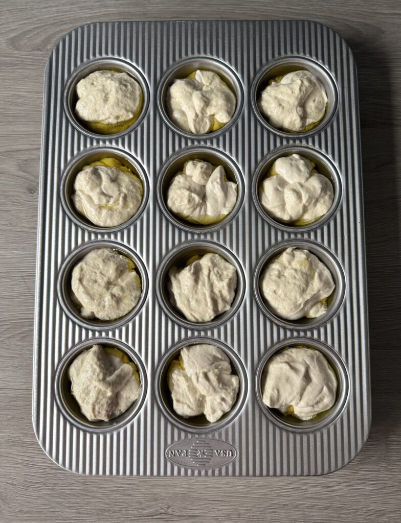 shaping cranberry bri focaccia muffins