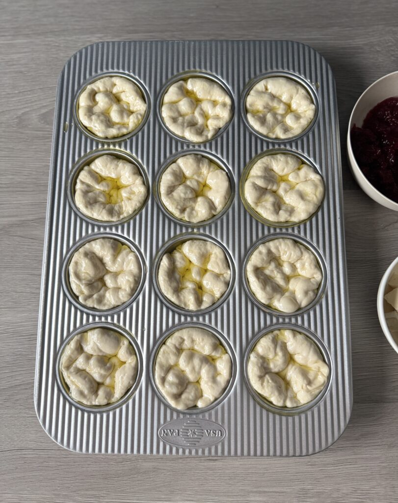 dimpled cranberry bri muffins