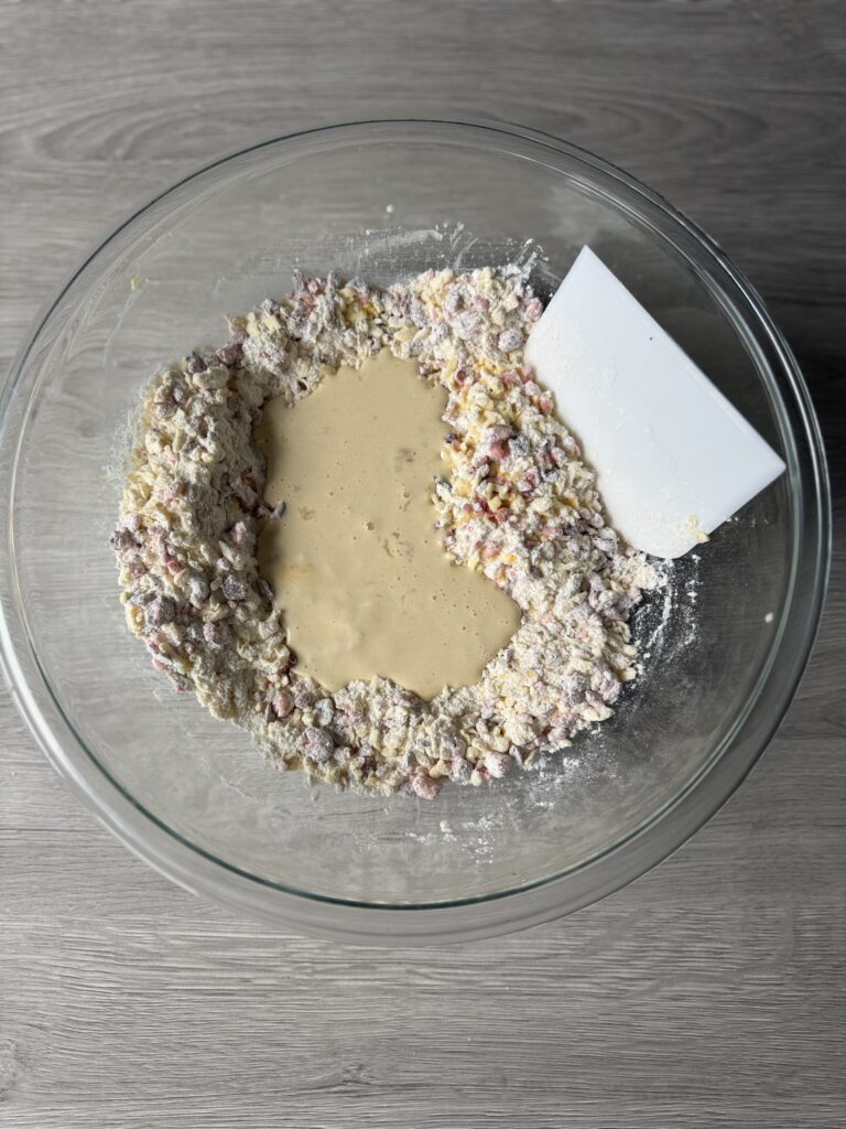 mixing cranberry orange scones