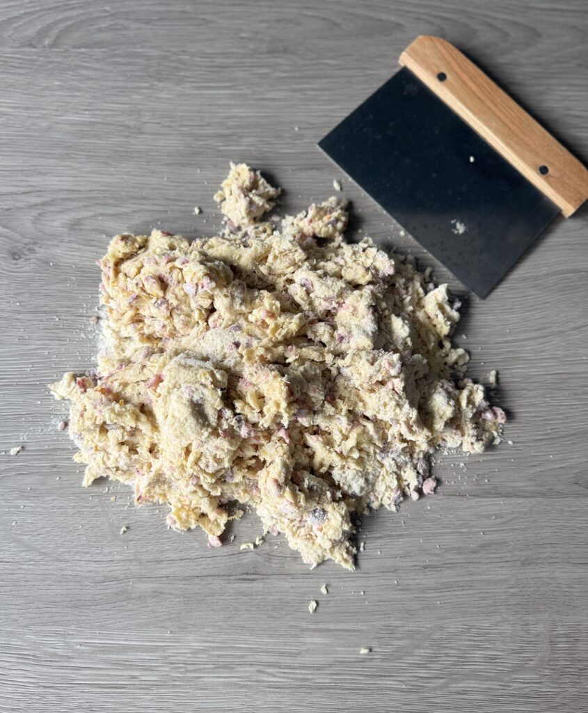 mixing cranberry orange scones