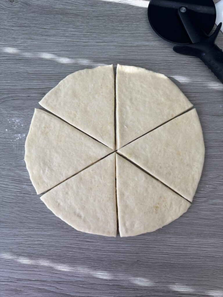 shaping cheese stuffed crescent rolls