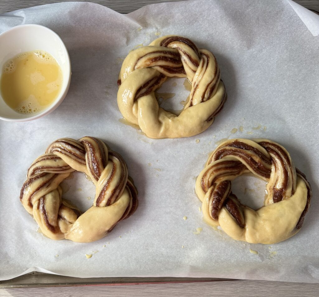 sourdough cinnamon swirl bread wreaths proofed