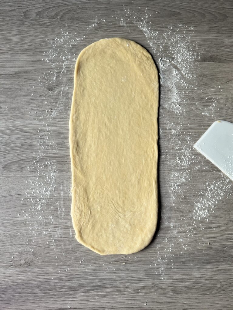shaping cinnamon swirl bread
