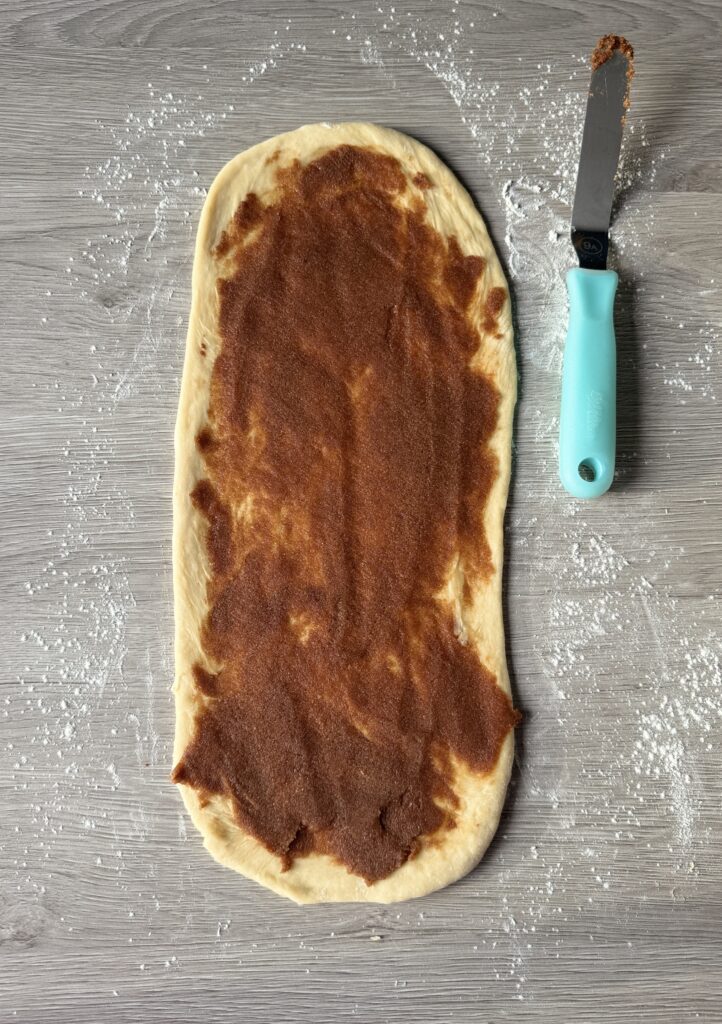 spreading cinnamon mixture