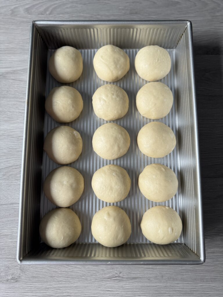 shaped dinner rolls in pan