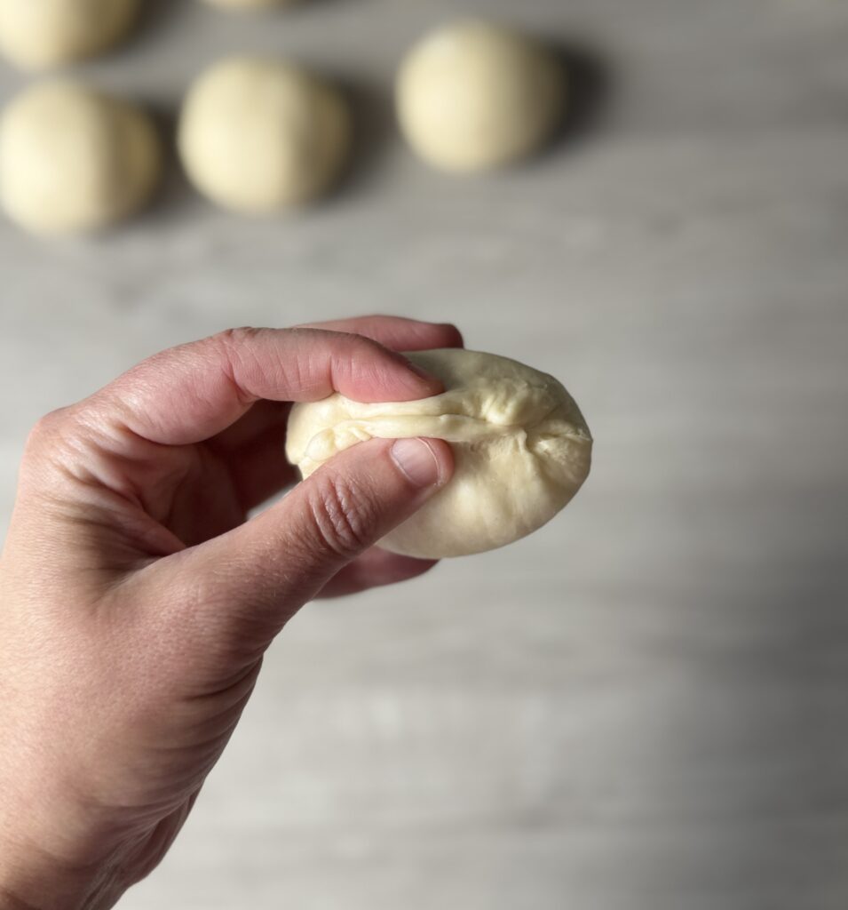 shaping dinner rolls