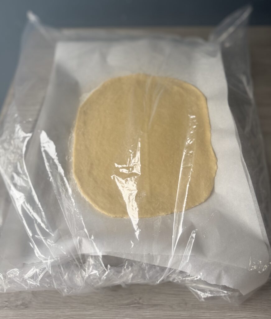 stacked and covered dough