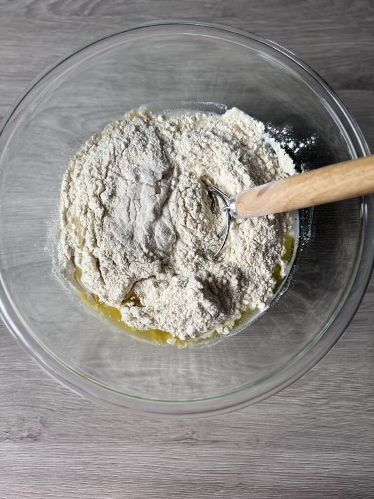 mixing pizza dough
