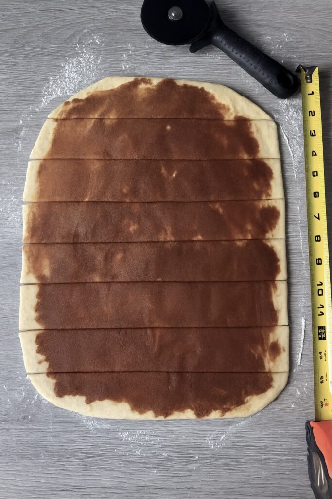 shaping cinnamon rolls