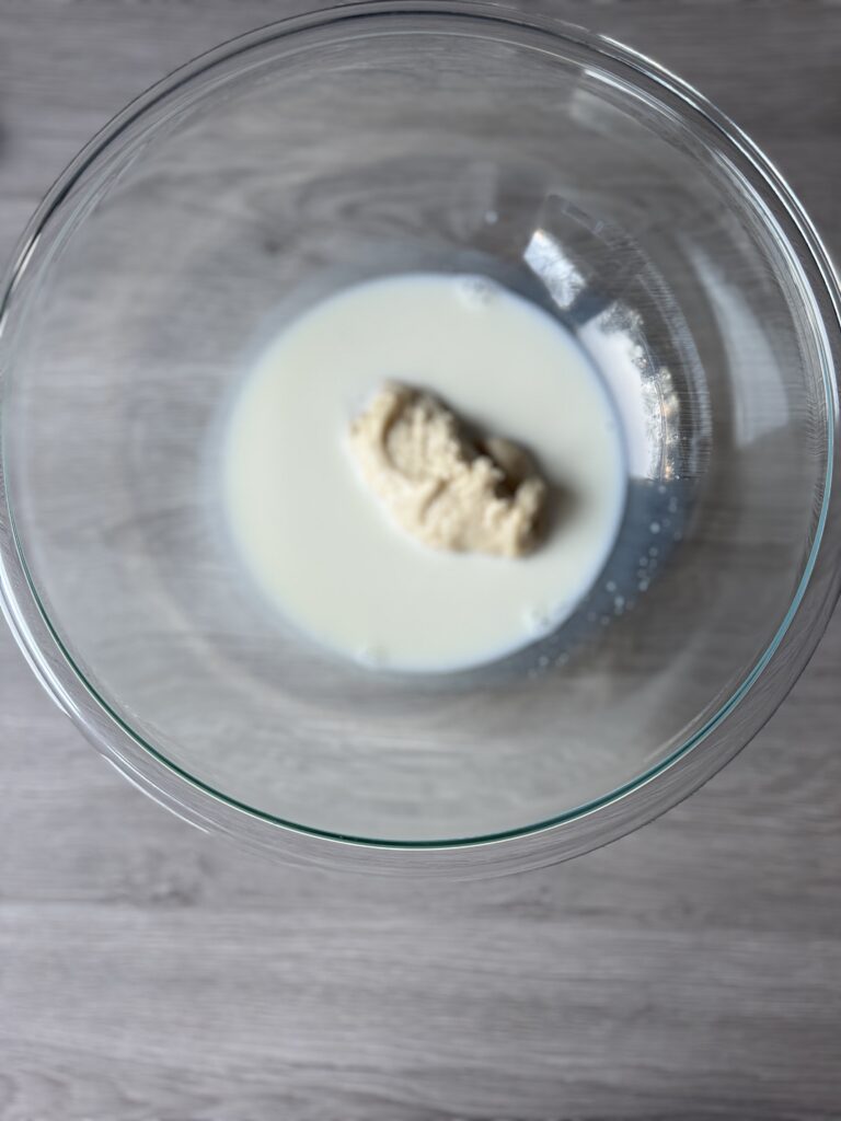 mixing cinnamon rolls