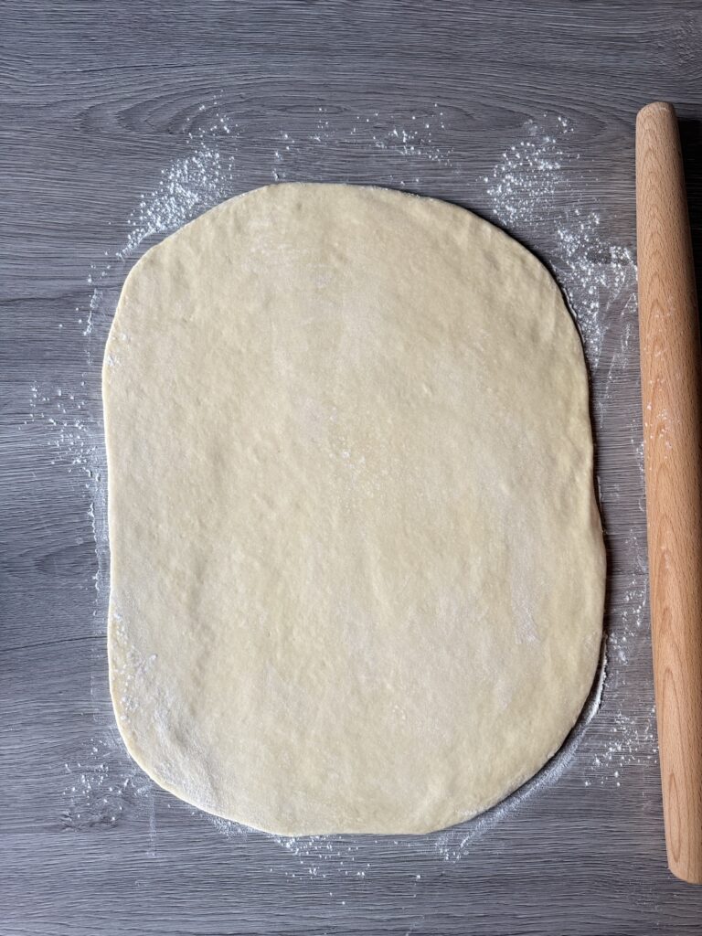 shaping sourdough cinnamon rolls