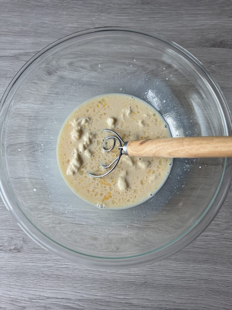 mixing cinnamon rolls