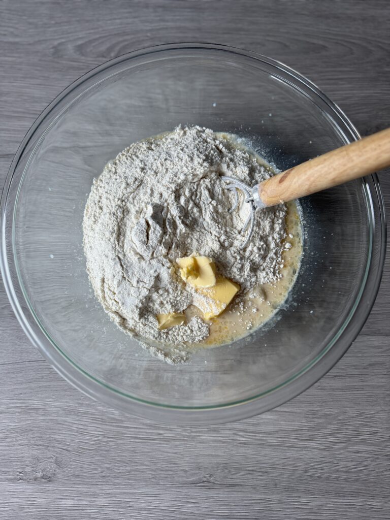 mixing cinnamon rolls