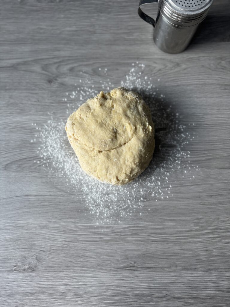 kneading the cinnamon roll dough