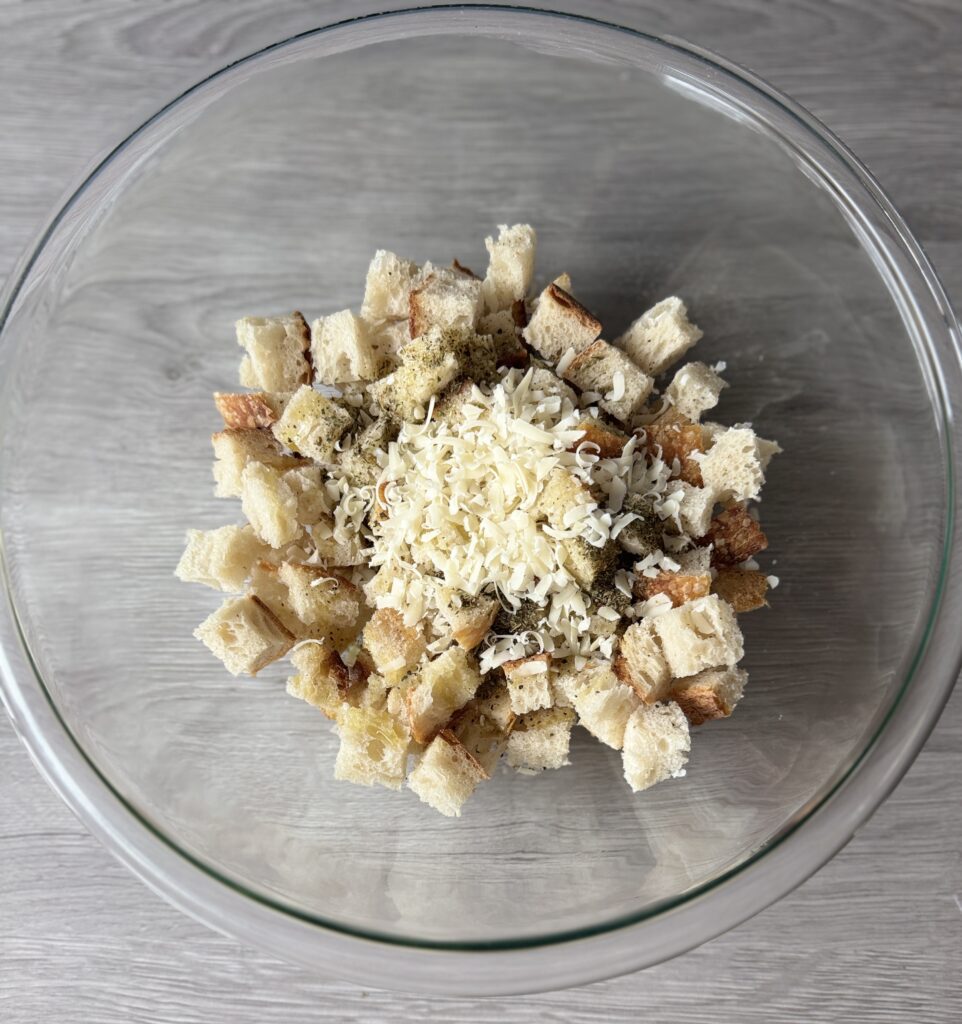 mixing sourdough croutons
