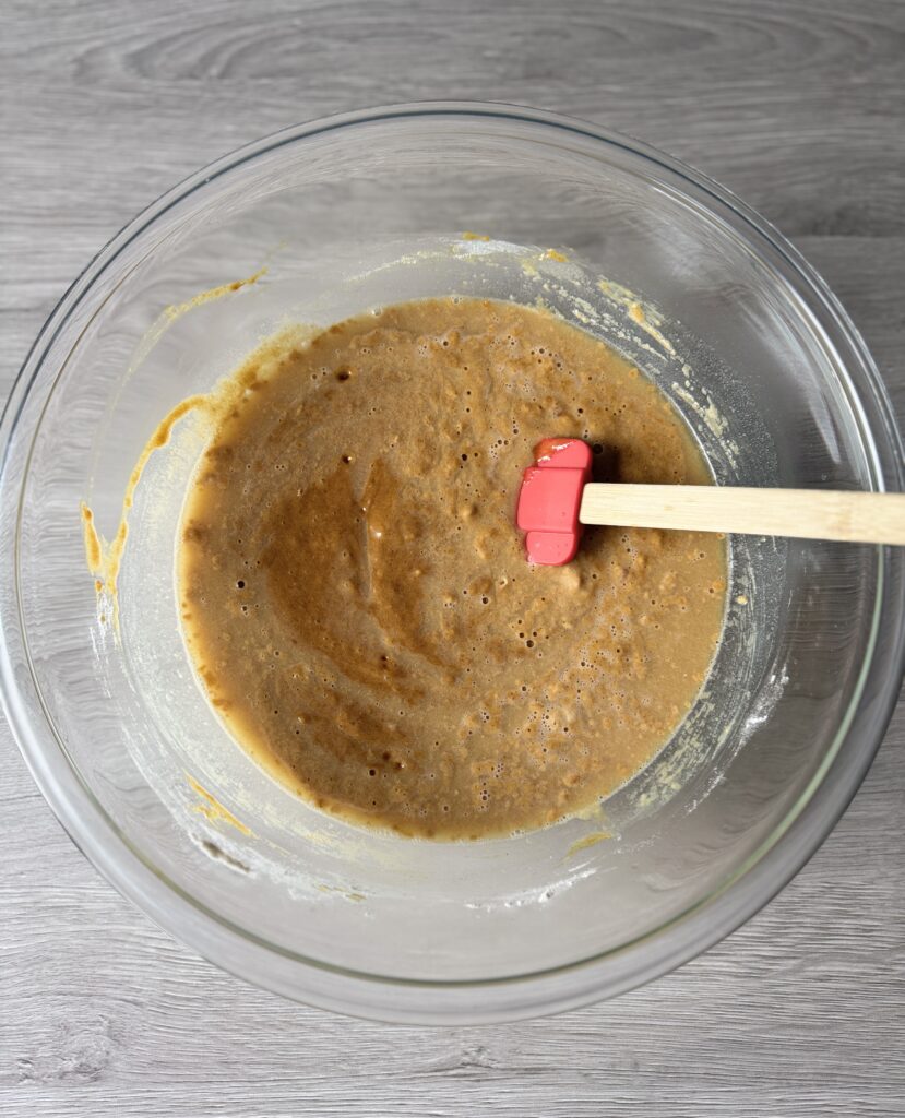 adding hot water to gingerbread cake