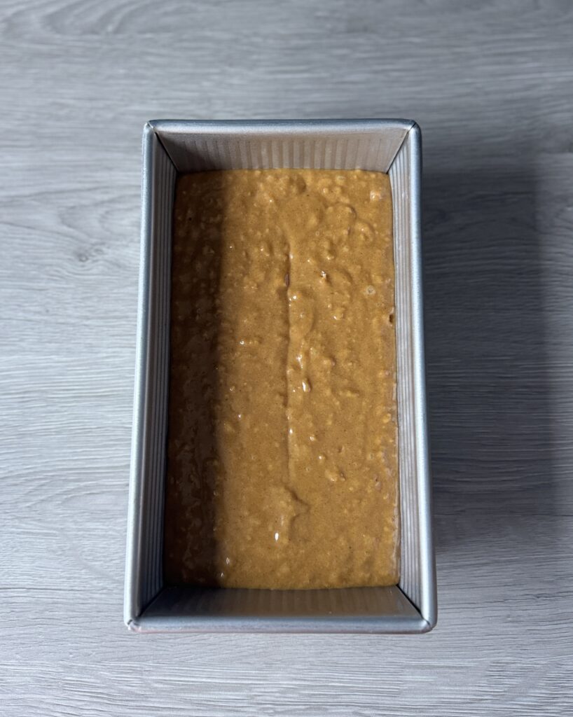 sourdough gingerbread discard loaf batter in pan