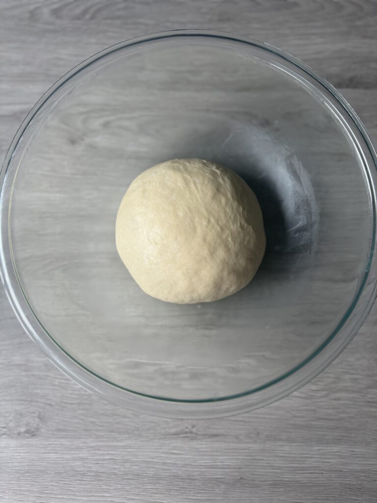 stretch and folded football dough