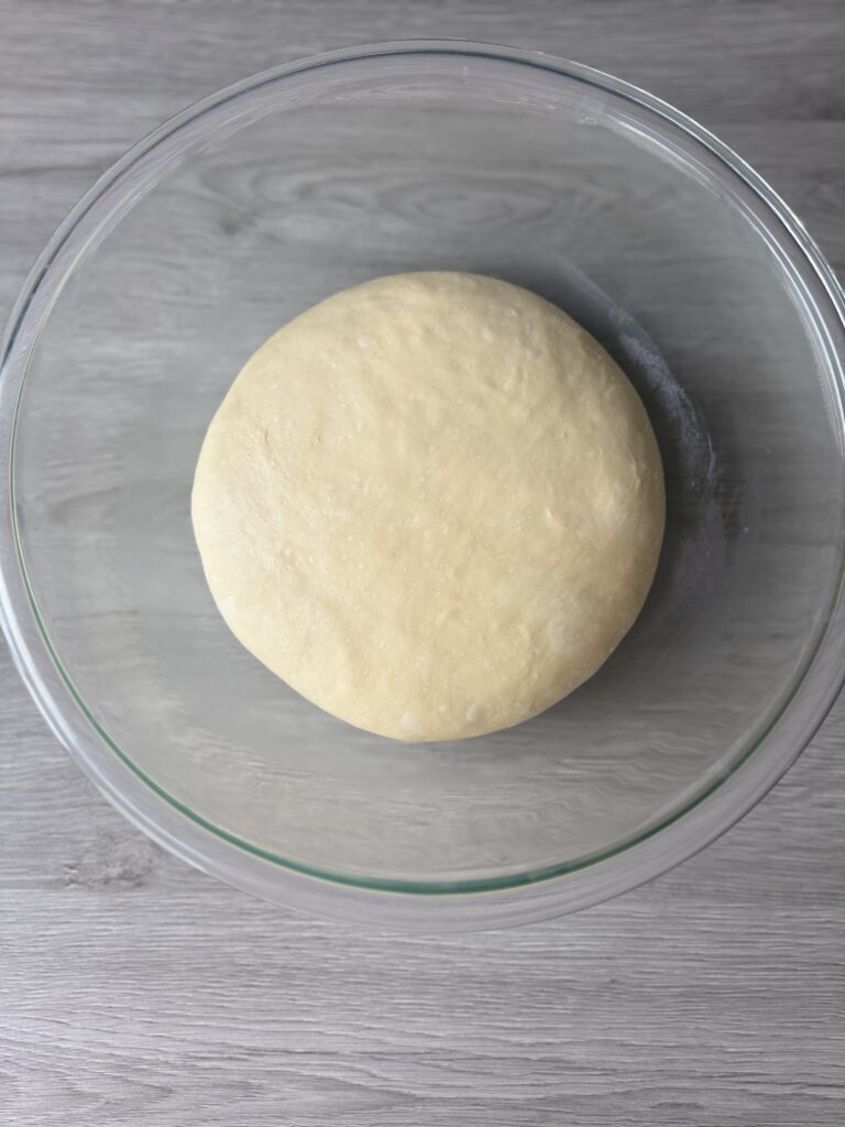 proofed football bread dough