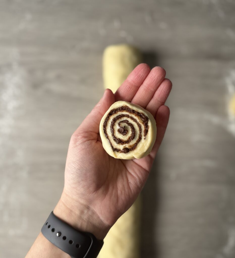 shaping cinnamon rolls