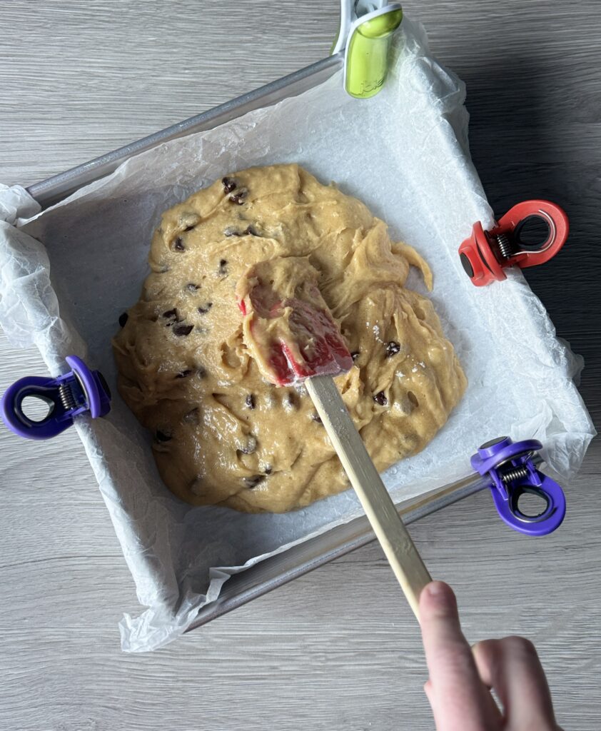 spreading blondie batter