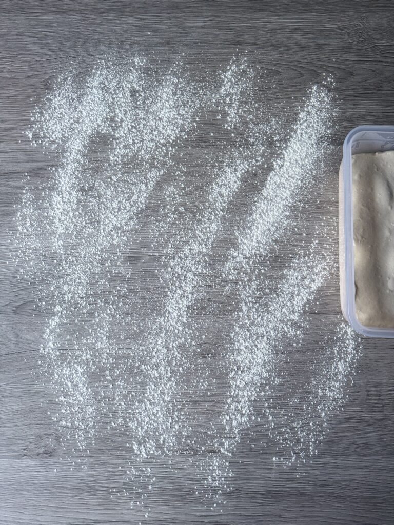 liberally floured work surface for siabatta dough