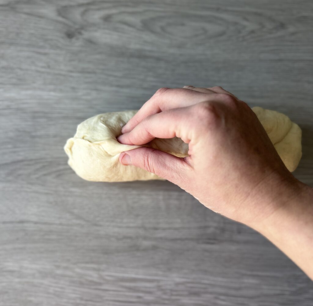 shaping sourdough discard French bread
