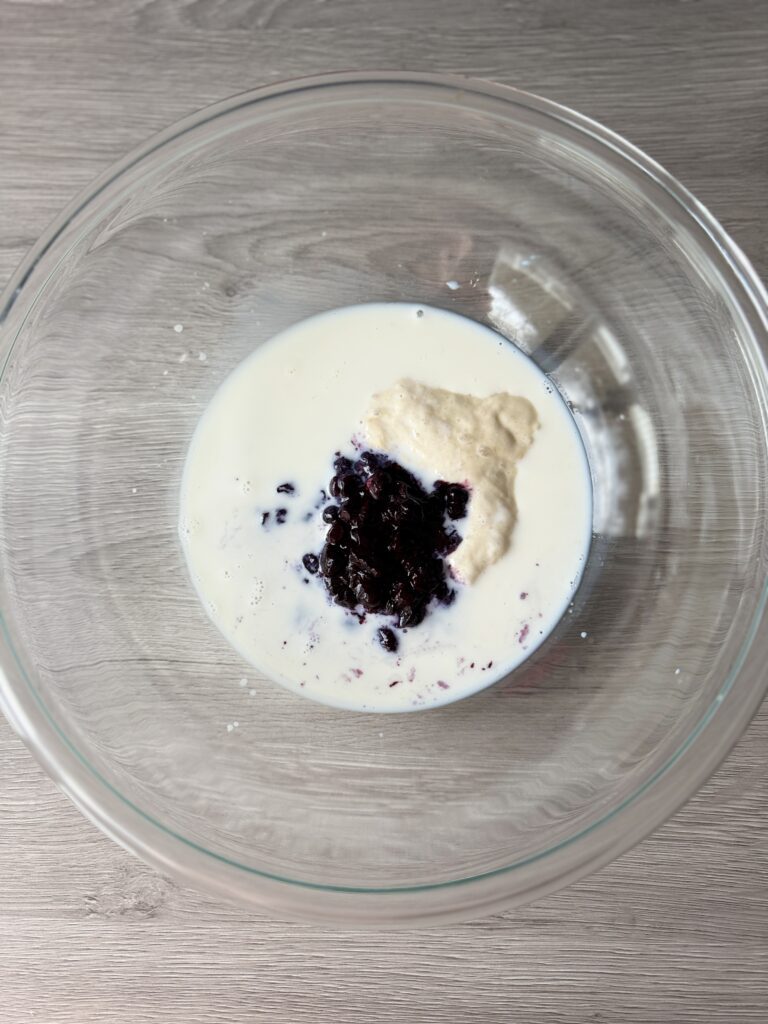 mixing blueberry English muffins