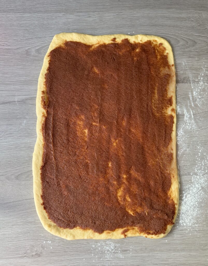 spreading the cinnamon filling