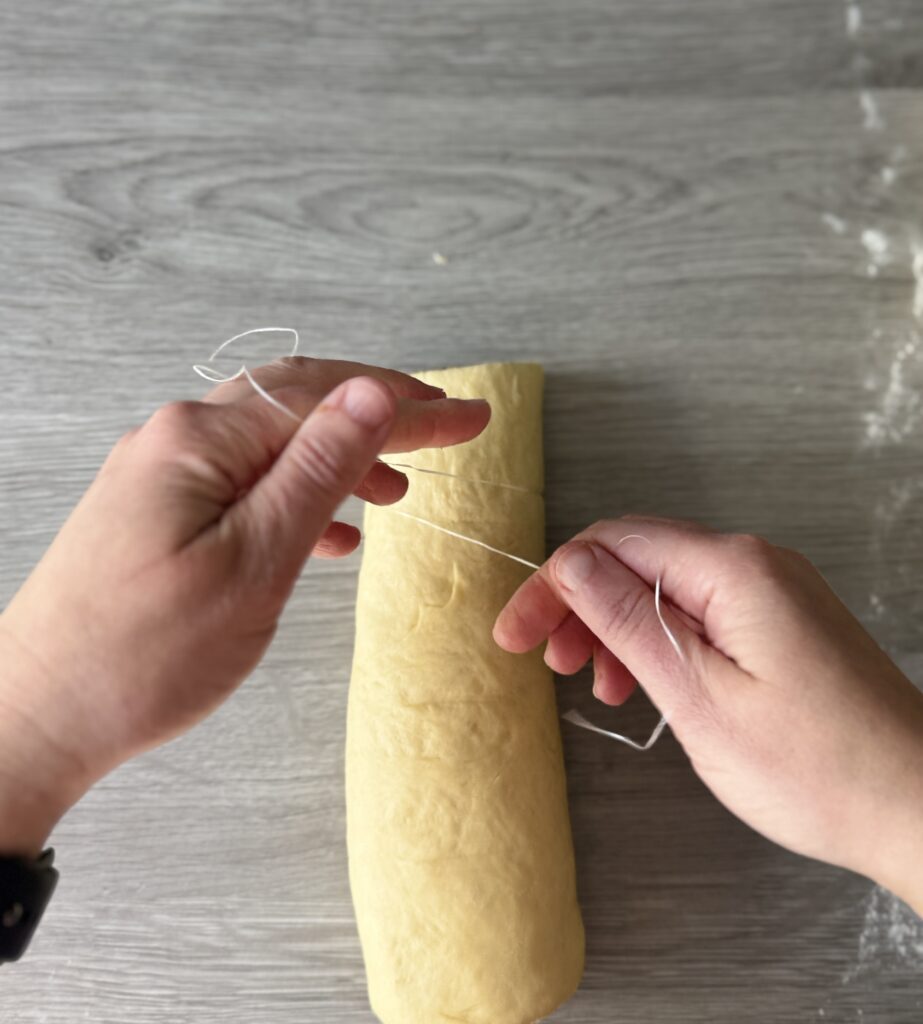 cutting sourdough discard cinnamon rolls