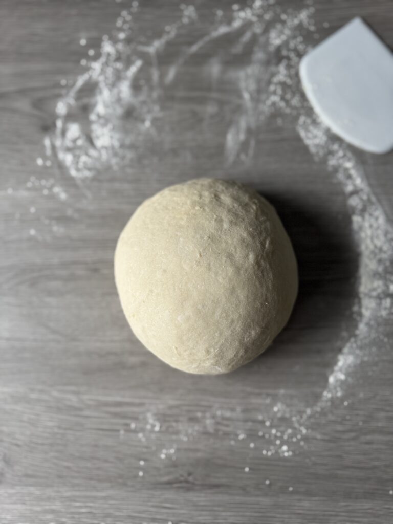 kneading hamburger bun dough