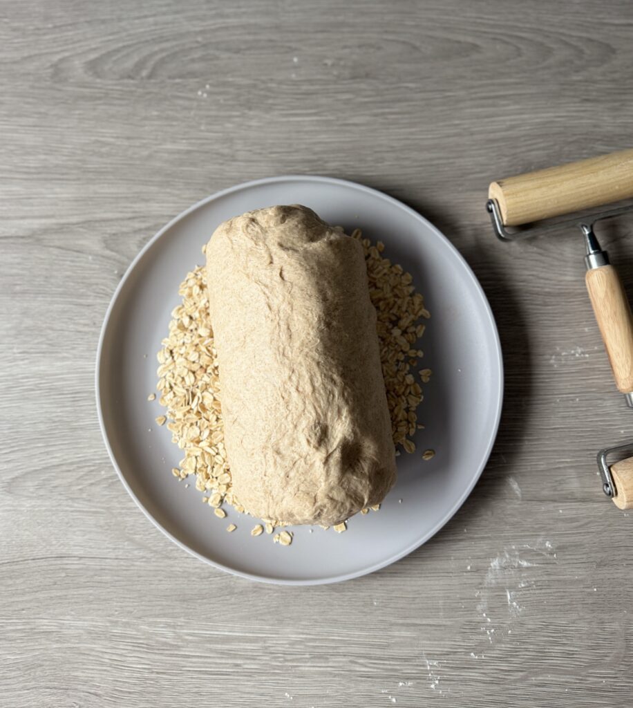 shaping honey wheat sourdough sandwich bread
