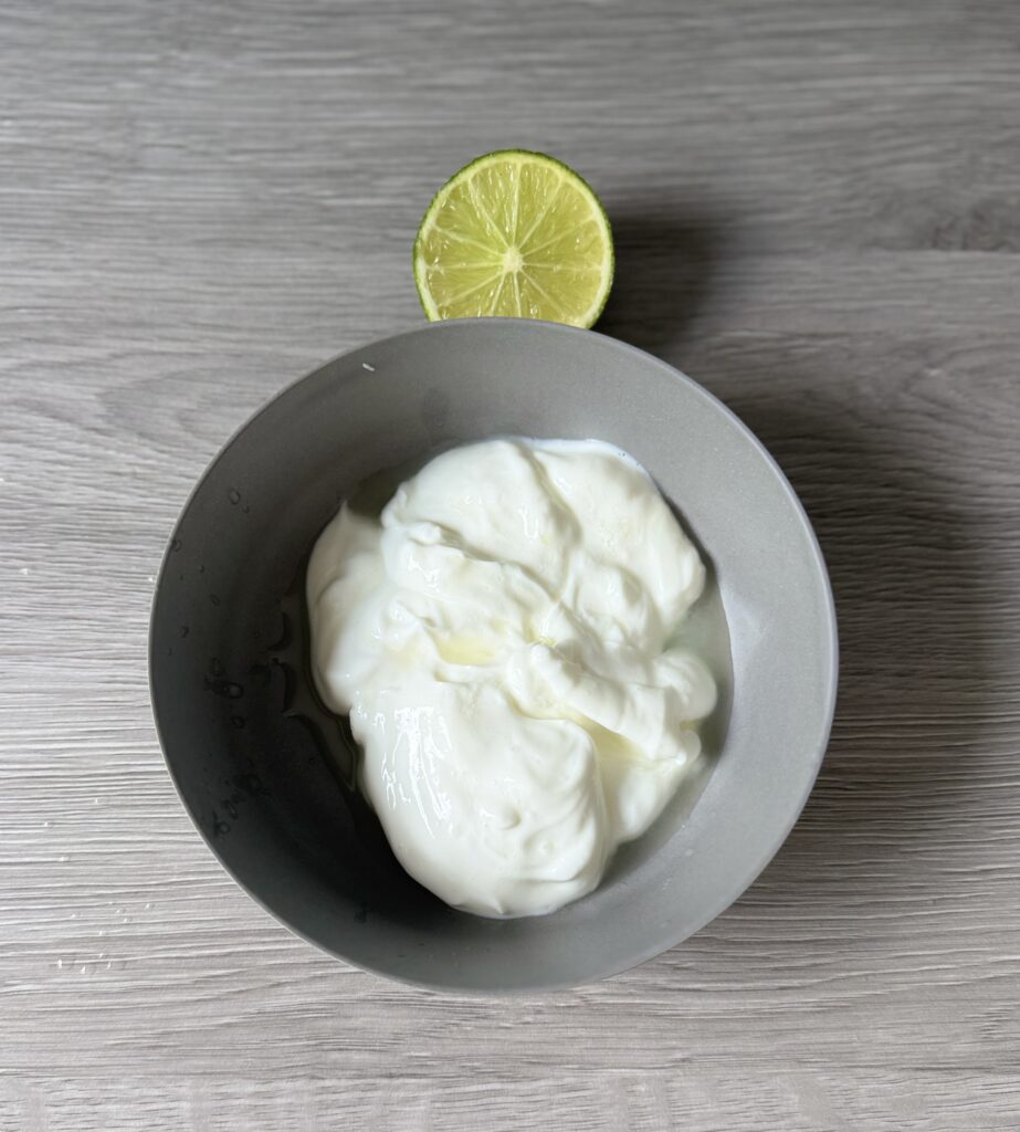 mixing Greek yogurt and lime