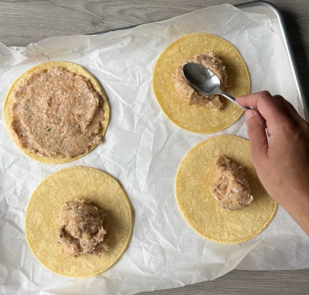 spreading meat mixture