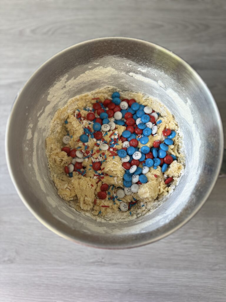 mixing 4th of July festive cookies