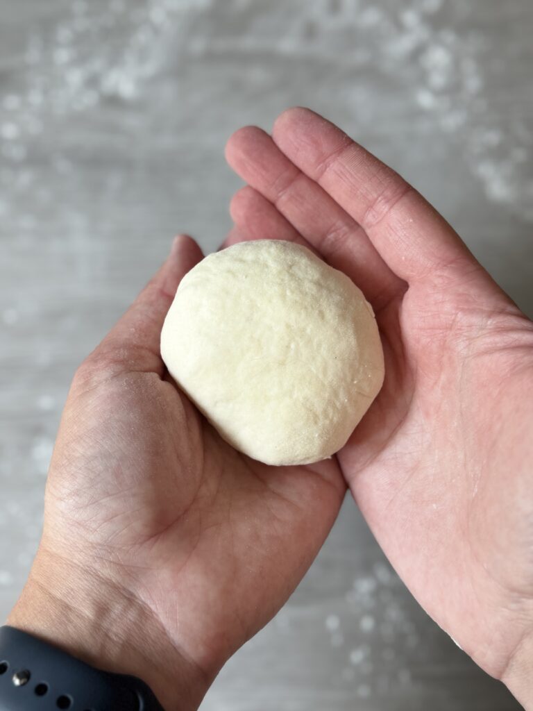 shaping cheese flatbreads