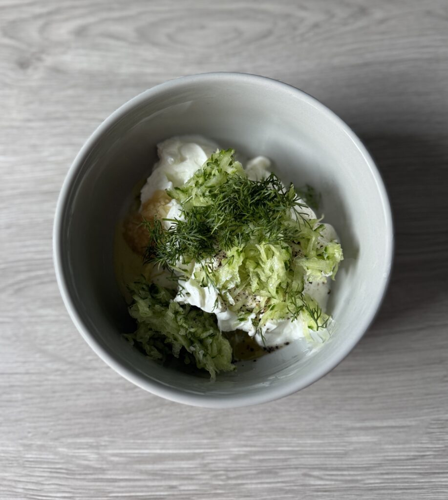 mixing tzatziki sauce