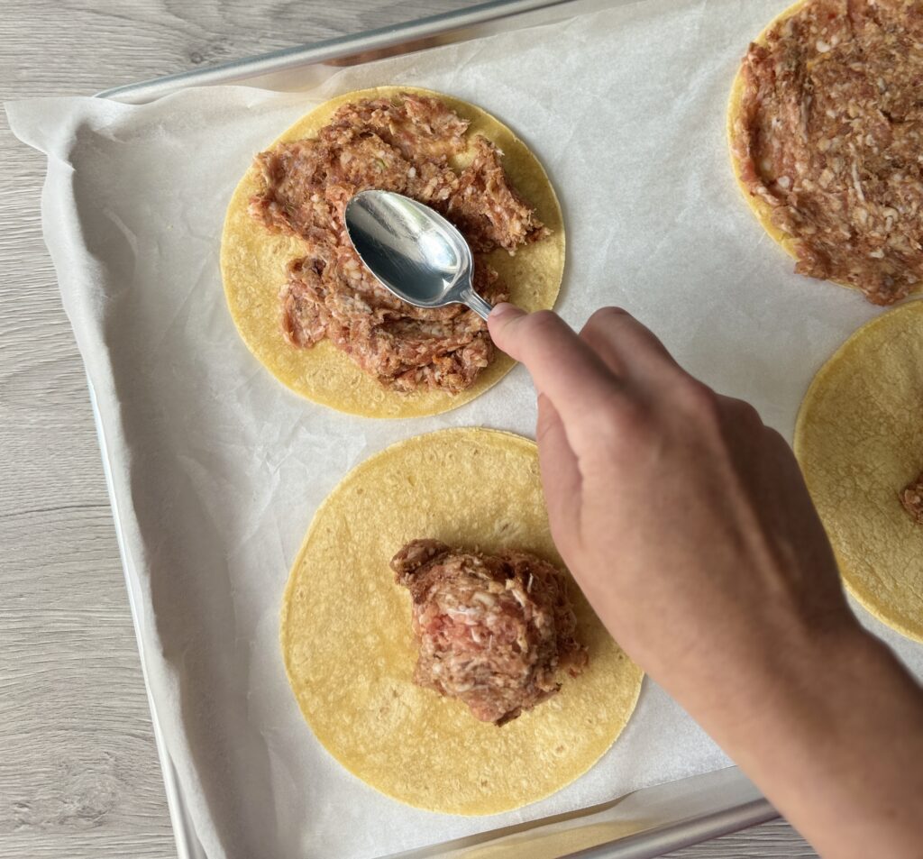 prepping smash breakfast tacos