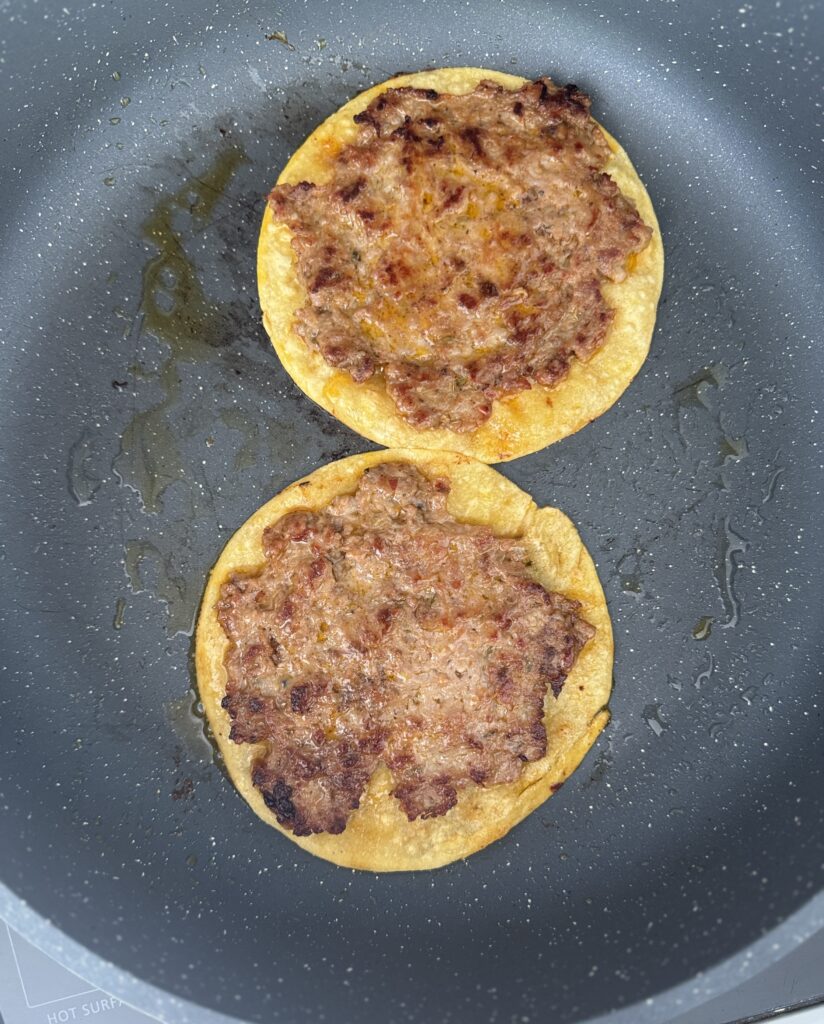 prepping smash breakfast tacos