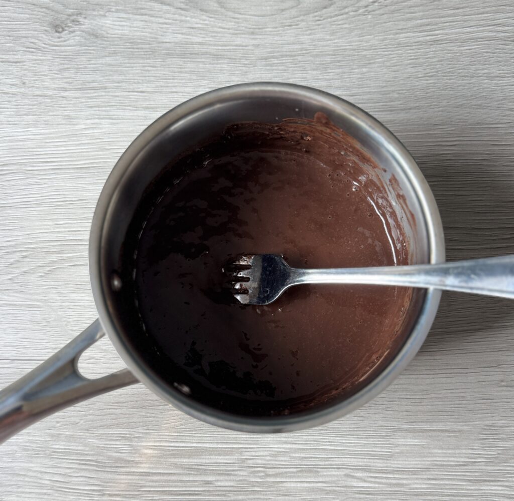 mixing chocolate donut muffins