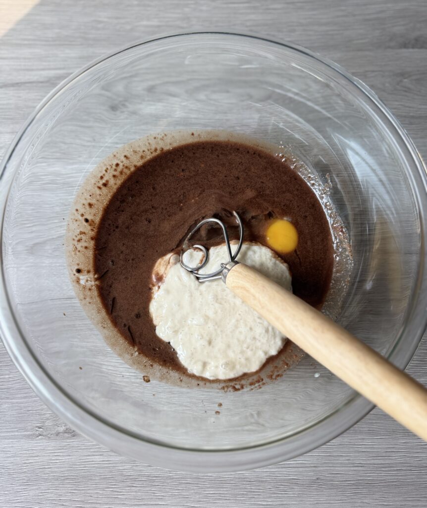 mixing chocolate donut muffins