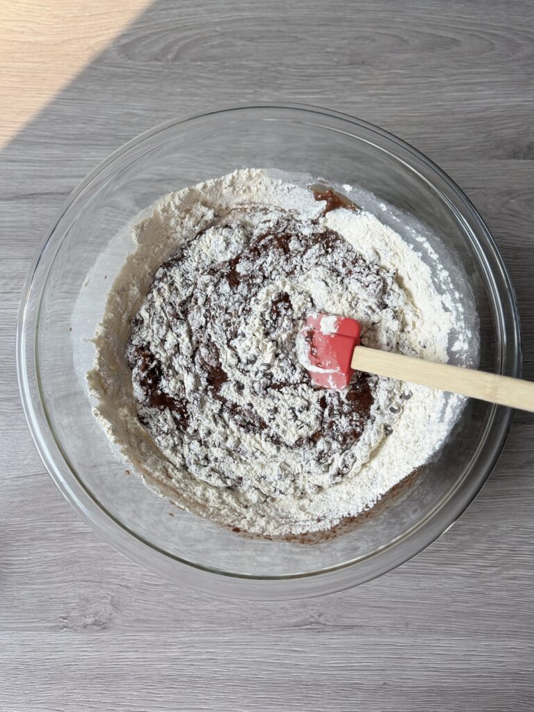 mixing chocolate donut muffins