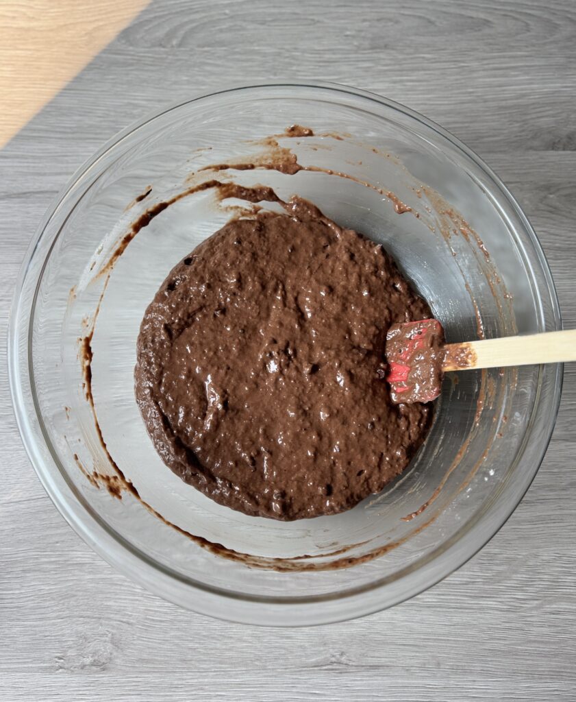 mixing chocolate donut muffins