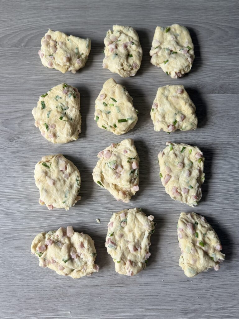 shaping ham and cheddar biscuit bombs