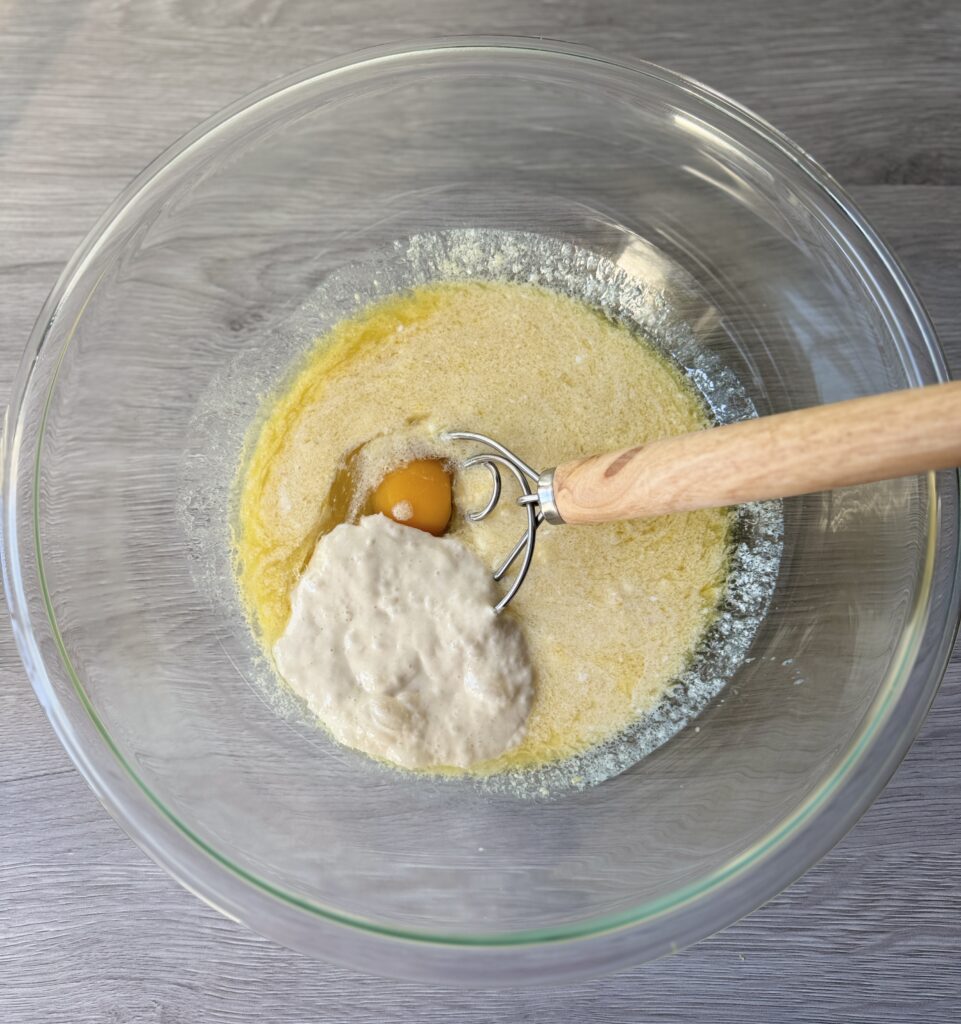 mixing blueberry lemon donut muffins