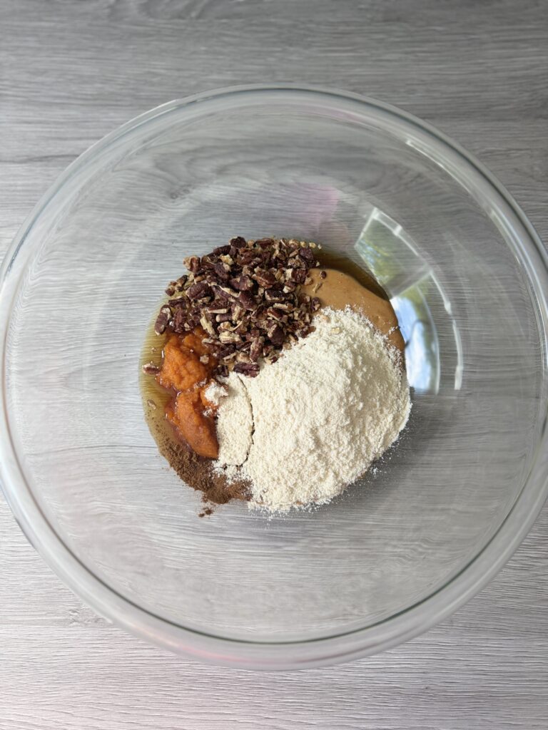 mixing pumpkin protein bites