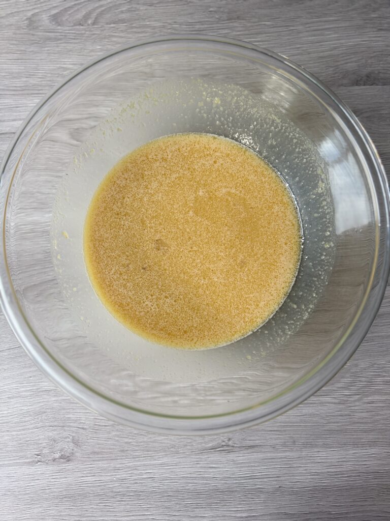 mixing apple cider bread