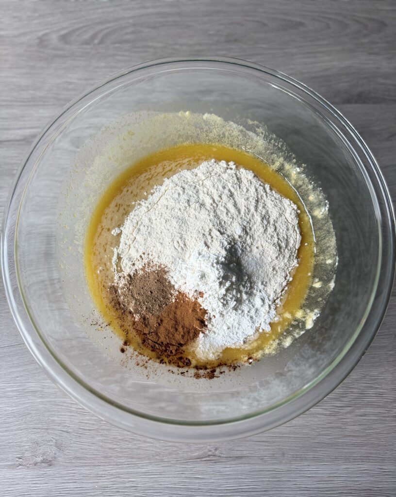 mixing apple cider bread